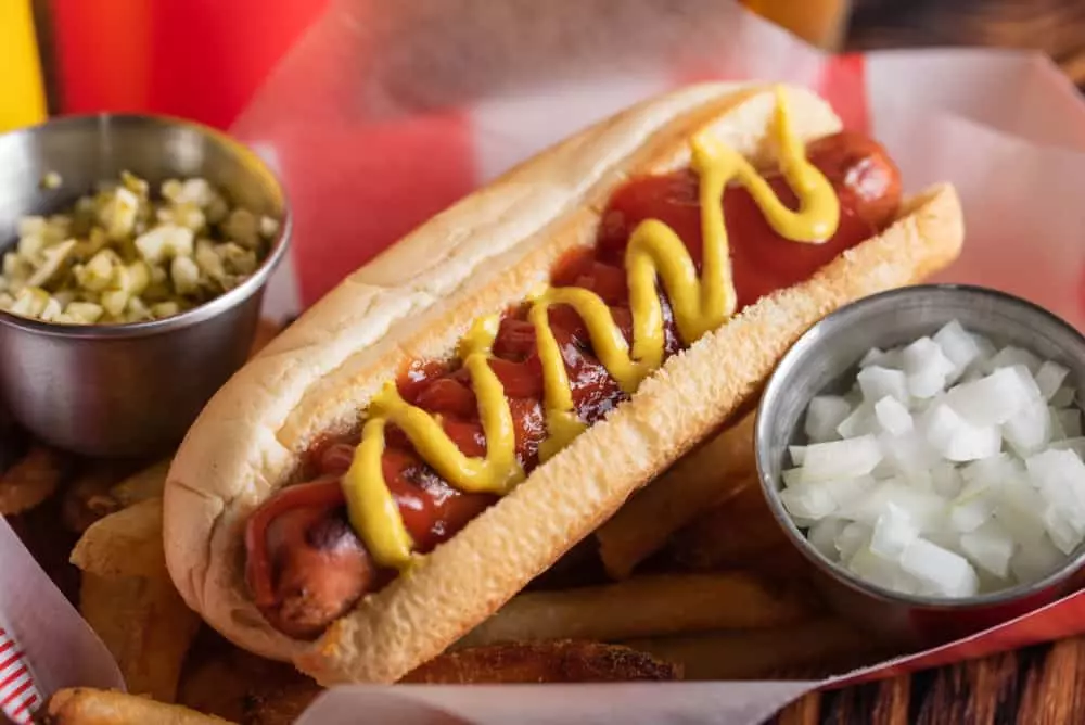 hot dog with condiments