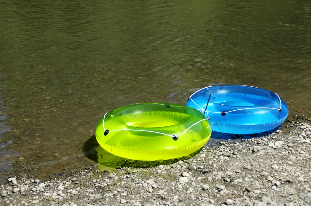 2 inner tubes next to river